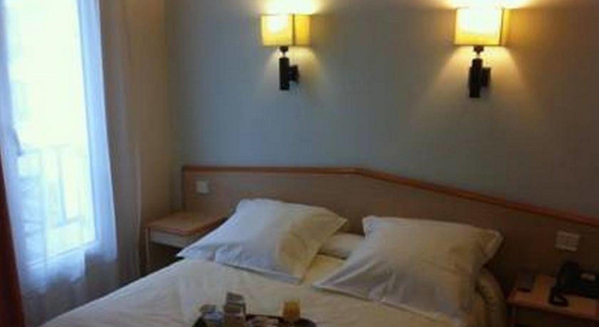 Hôtel Briand devient Hotel IPL Levallois-Perret Buitenkant foto